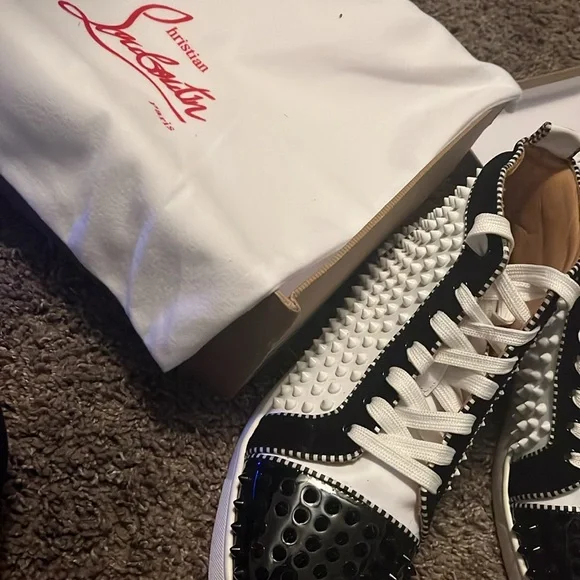 White and black “Christian Louboutin” Louis Flat Calf Spiked. Size 8 1/2.